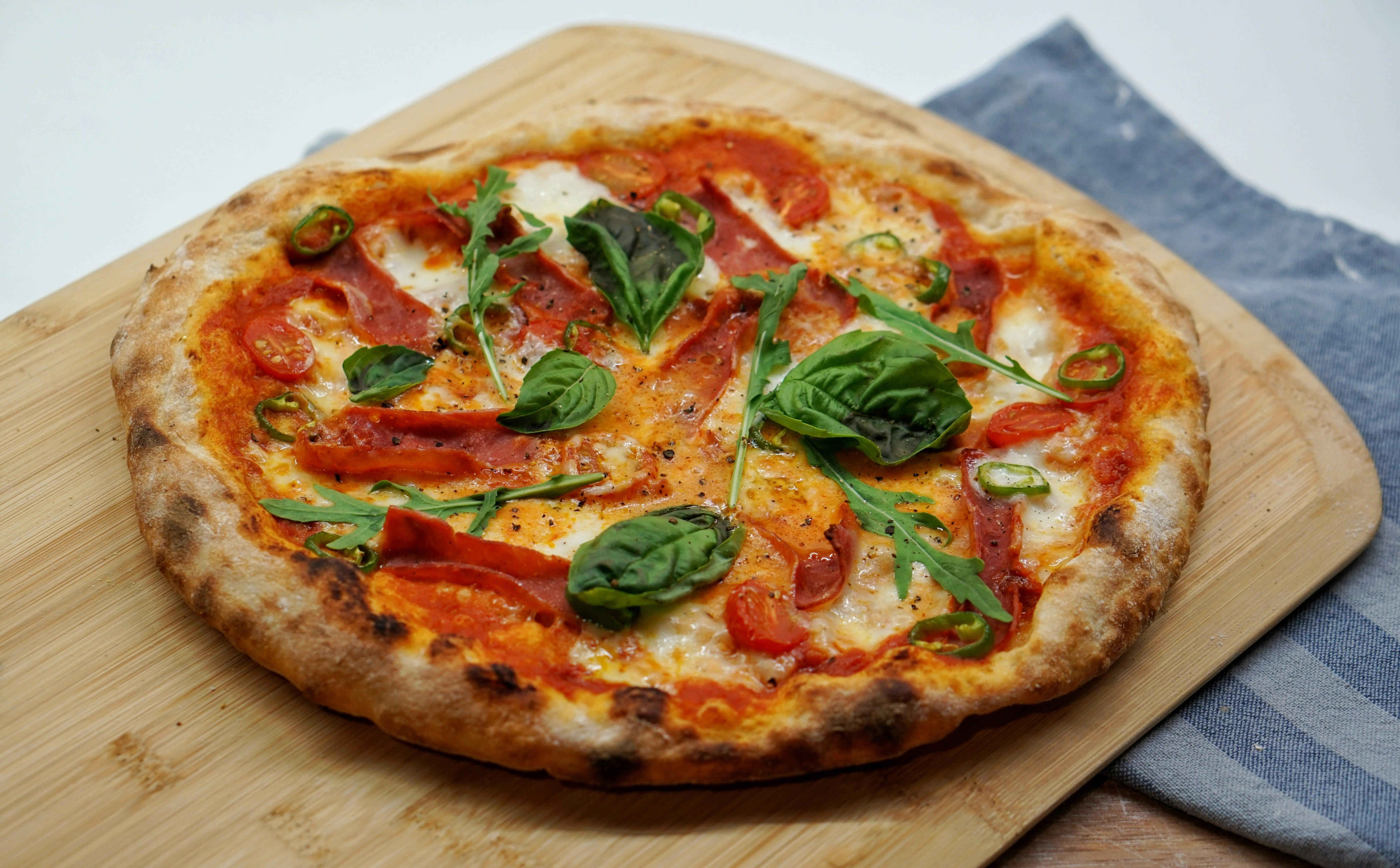 Margherita pizza with basil leaves